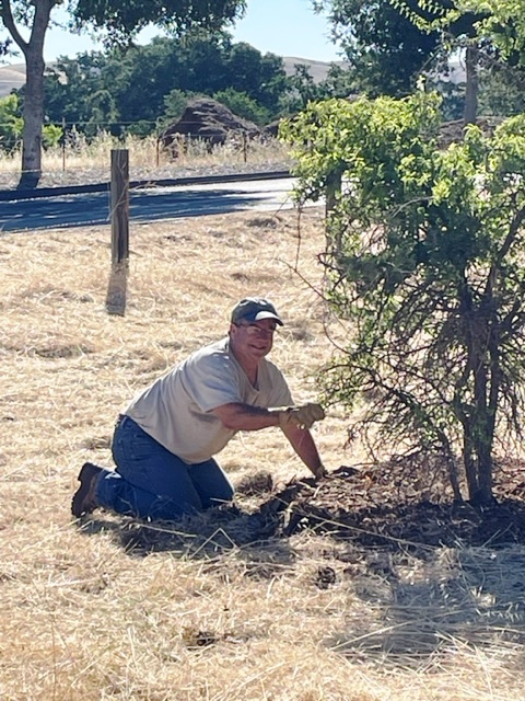 Mike spreading mulch!